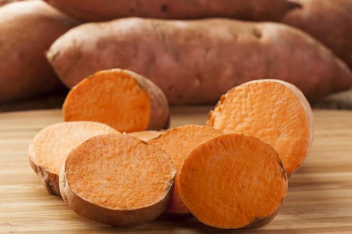 Sweet potatoes cut open. Photo Credit: Brent Hofacker/Shutterstock
