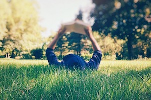 lying in the grass