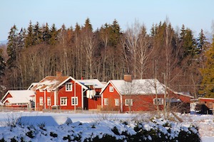 snow melting from cottage roof