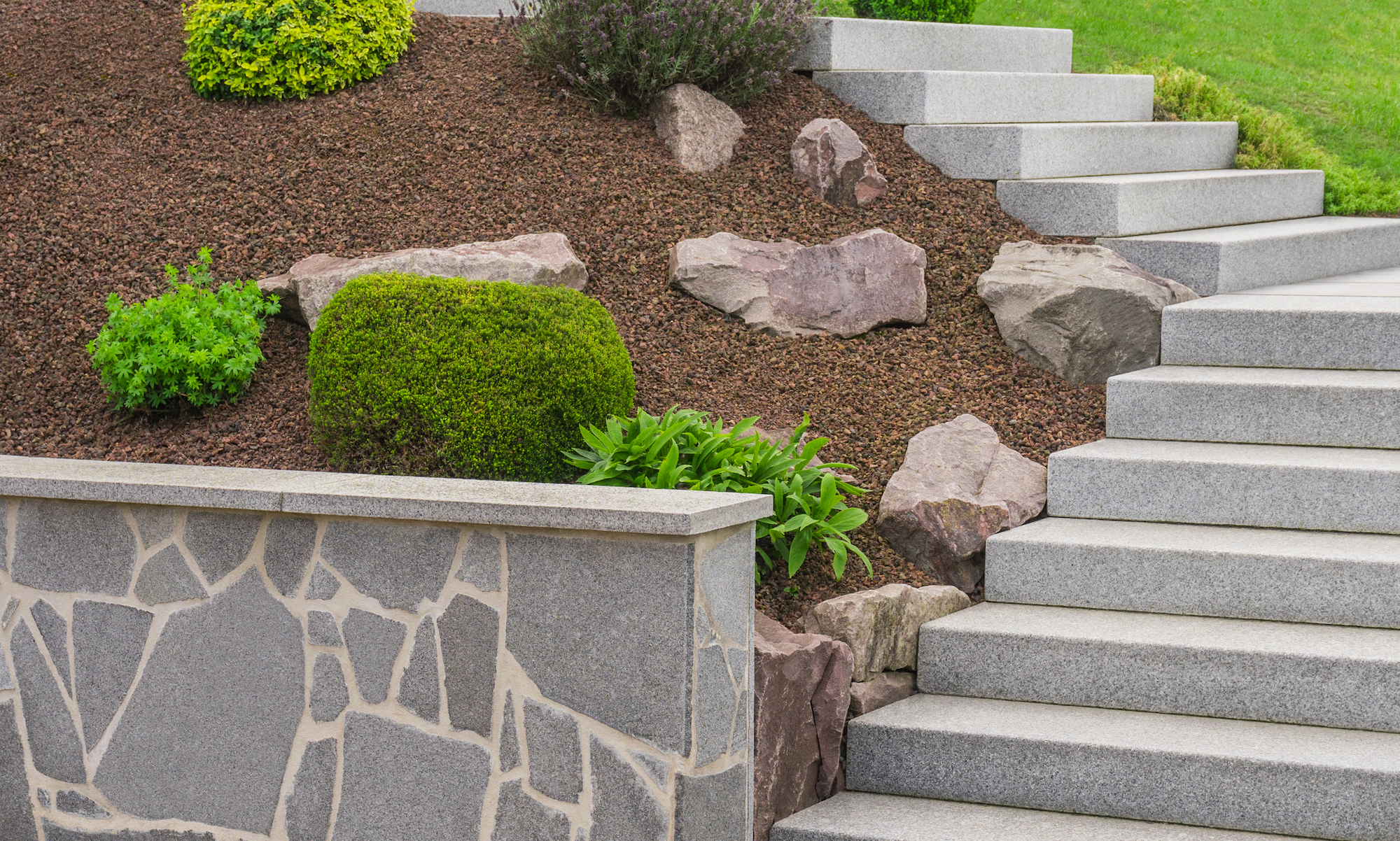 Rock garden on a slope near steps