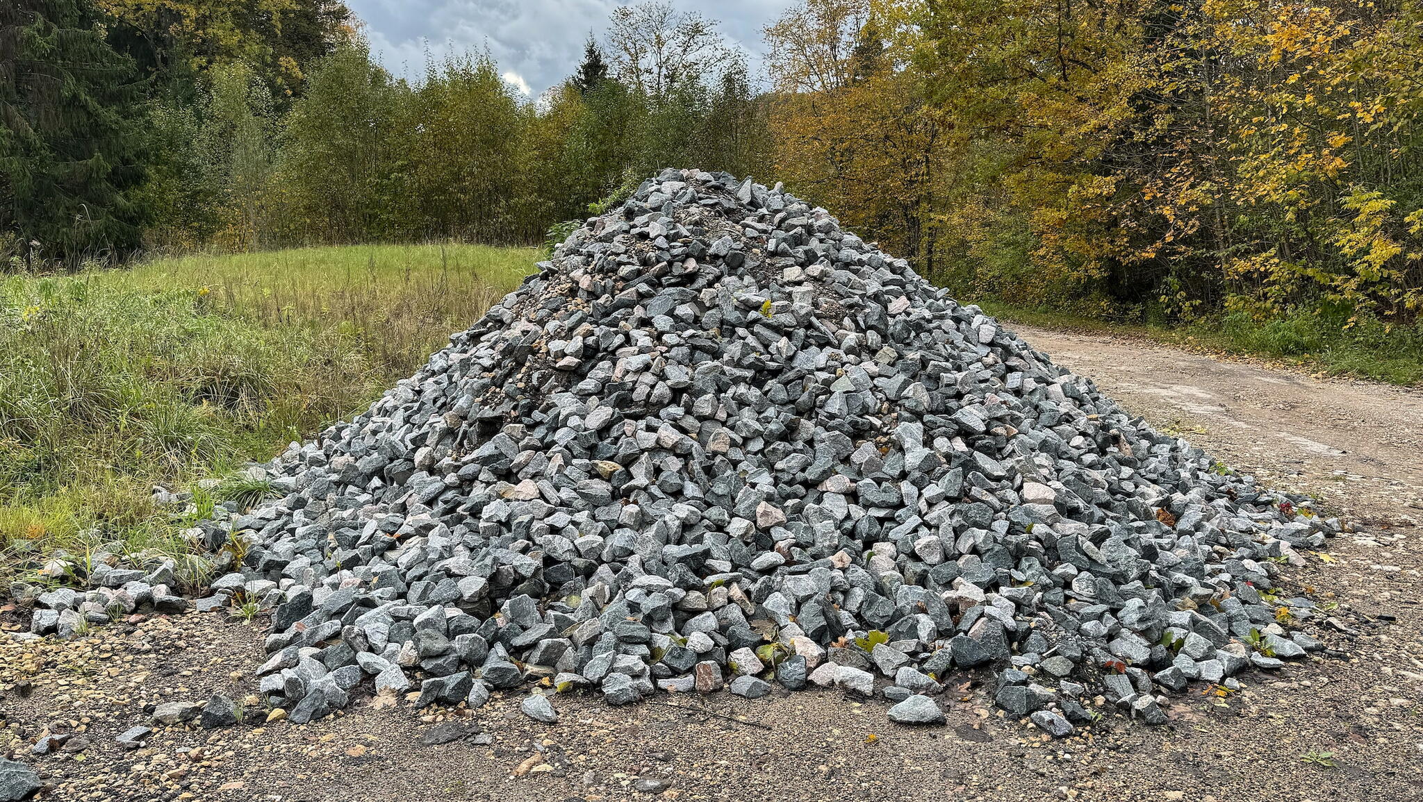 Grey crushed stones. Building material for horticulture and landscape gardening.