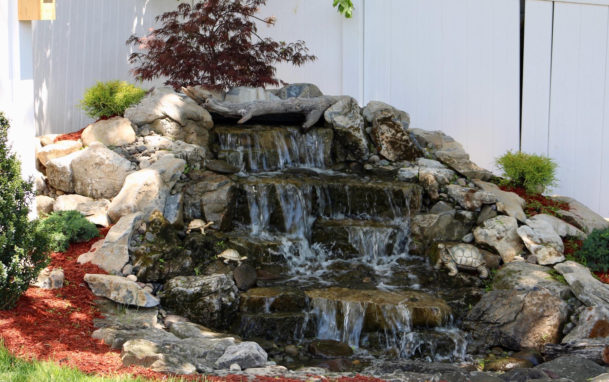 Rock waterfall in yard