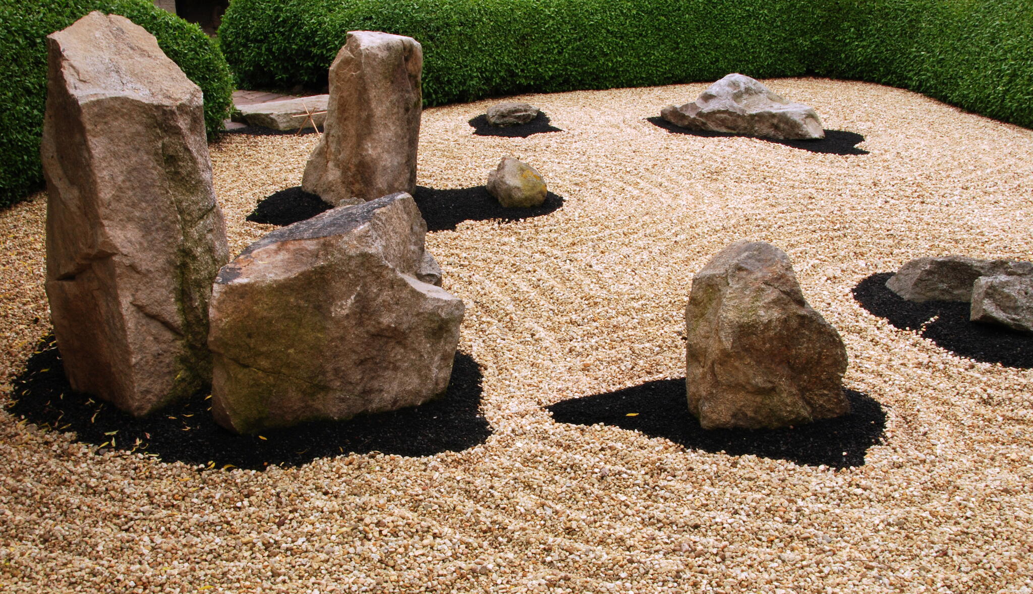 Zen garden with rocks and pebbles.